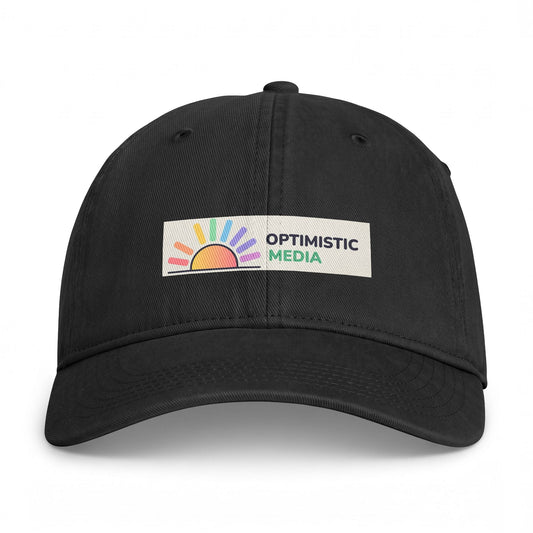 Coastal Washed Cap — "Optimistic Media" Sun Logo Dad Hat